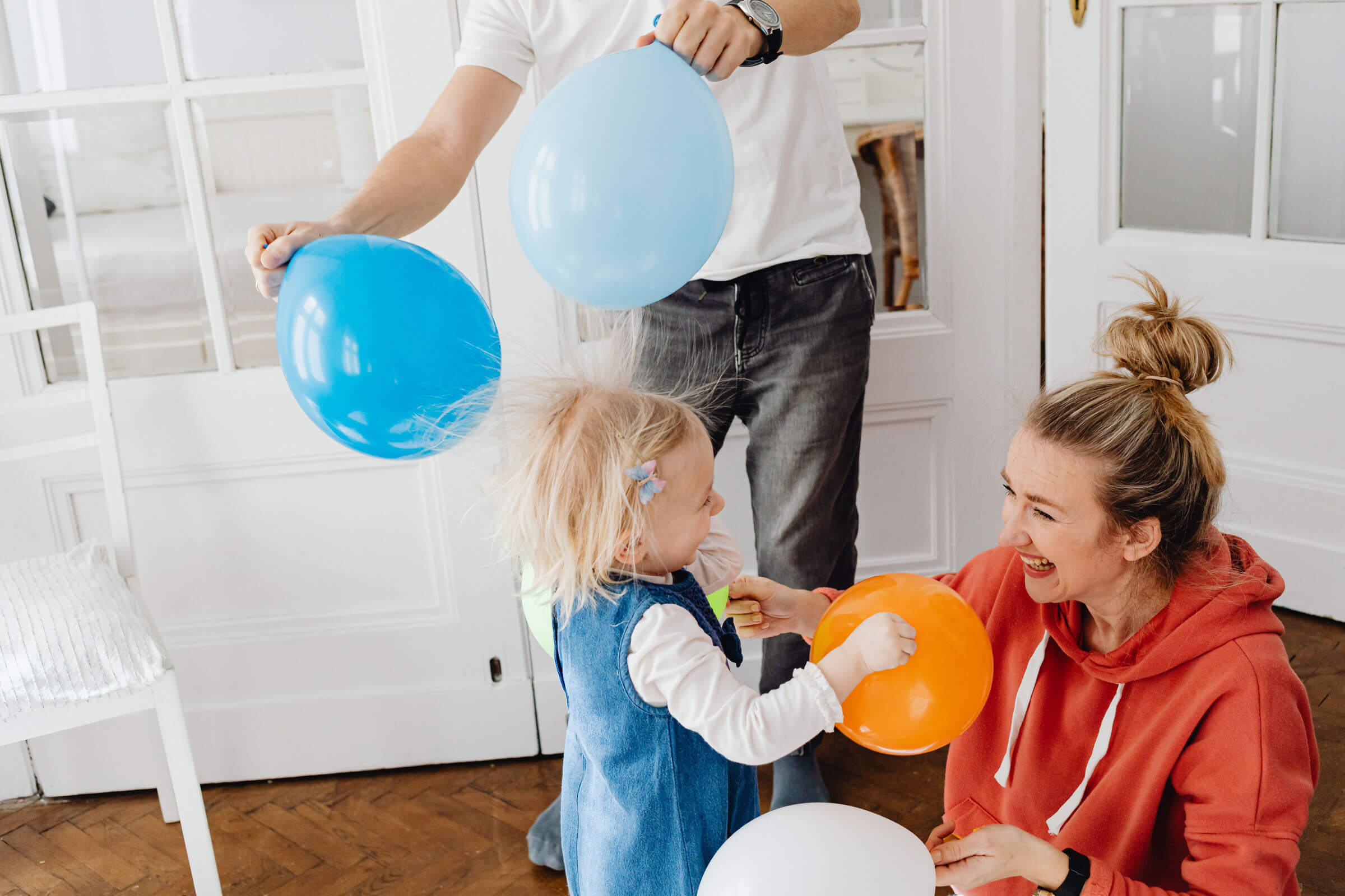 Happy family with smoke alarm installed