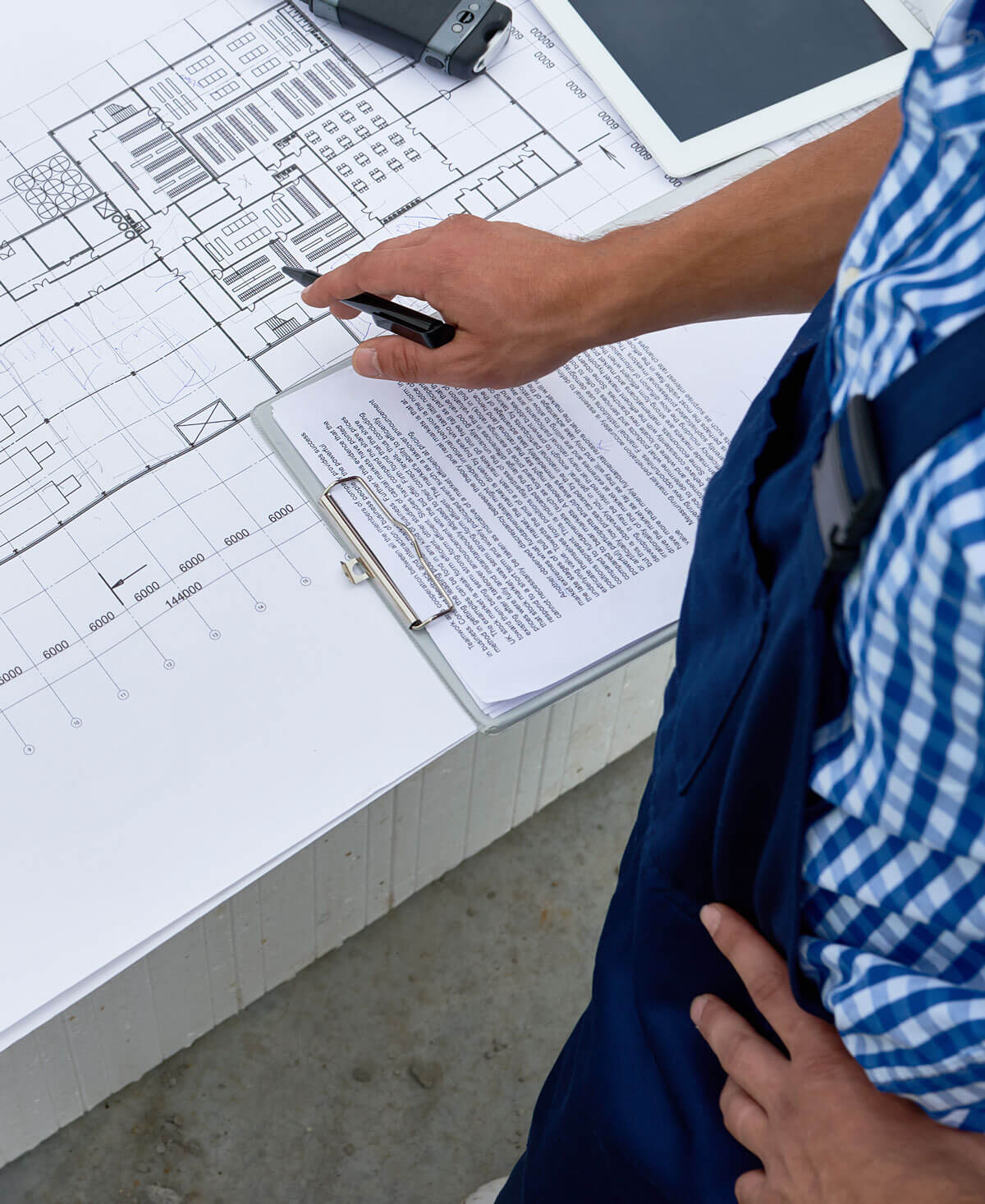 checking floor plan for smoke alarm installation